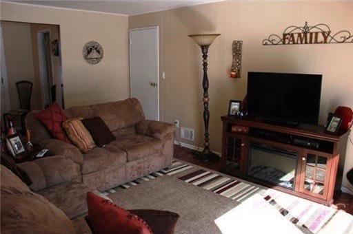 116 Prentice Avenue South River, NJ 08882 - Photo 14 of 27 a living room with furniture and a flat screen tv
