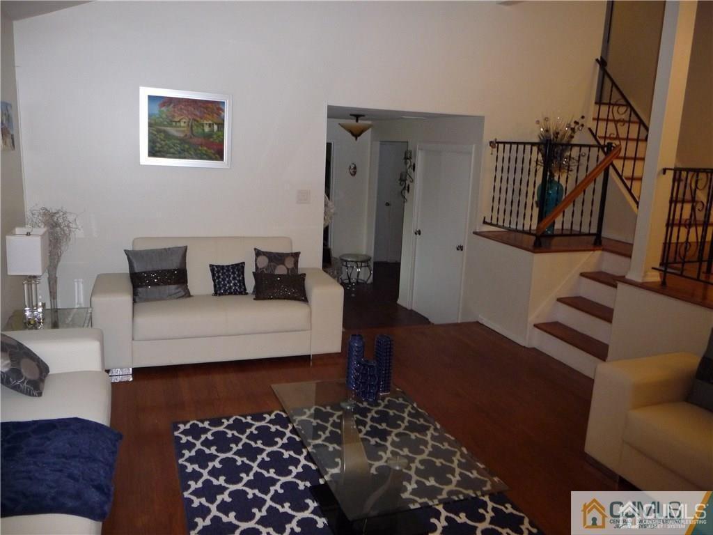 116 Prentice Avenue South River, NJ 08882 - Photo 17 of 27 a living room with furniture and a rug