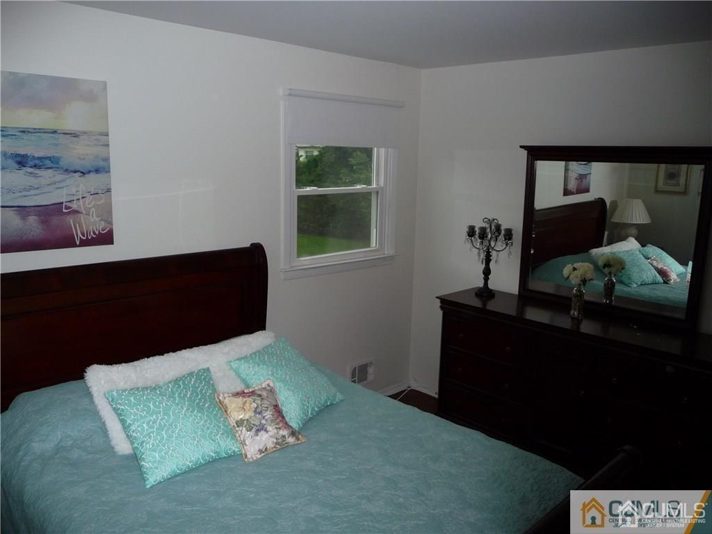 116 Prentice Avenue South River, NJ 08882 - Photo 21 of 27 a bedroom with bed and window