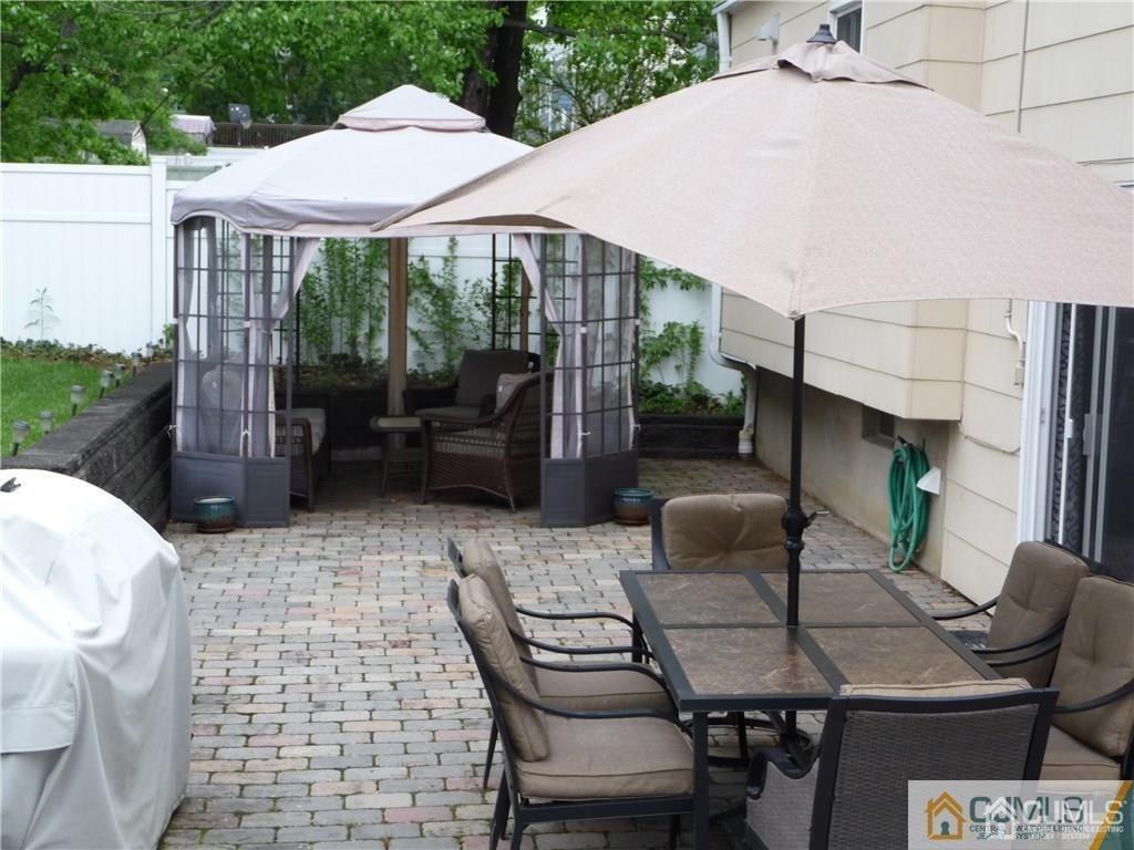 116 Prentice Avenue South River, NJ 08882 - Photo 25 of 27 a patio with table and chairs