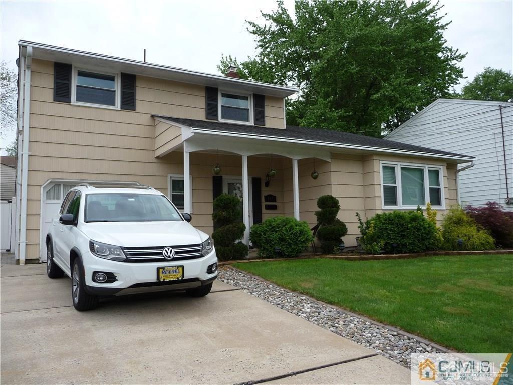 116 Prentice Avenue South River, NJ 08882 - Photo 3 of 27 a house view with a garden space