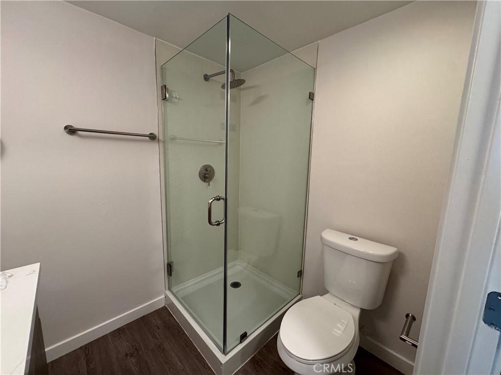 1102 Barbara Street, Unit B Redondo Beach, CA 90277 - Photo 13 of 22 a white toilet sitting next to a bathroom sink
