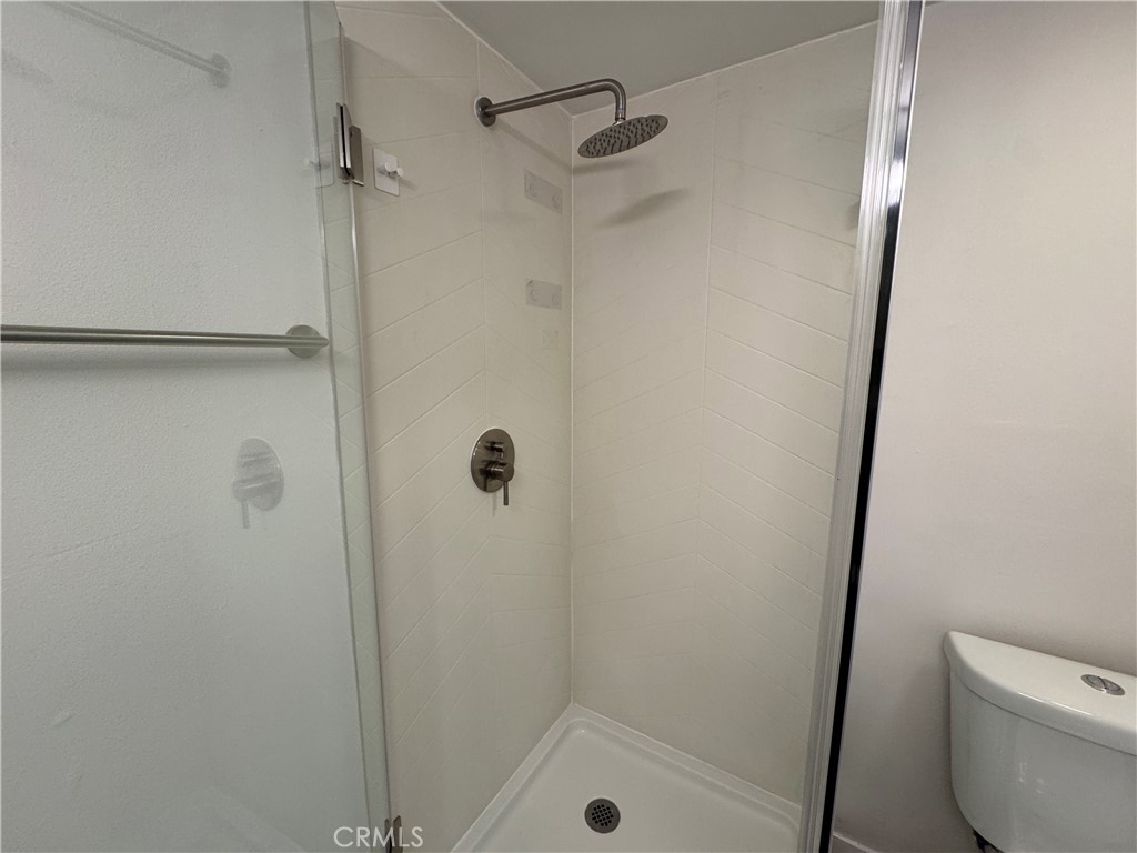 1102 Barbara Street, Unit B Redondo Beach, CA 90277 - Photo 15 of 22 a bathroom with a shower and toilet