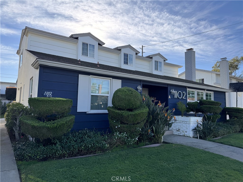 1102 Barbara Street, Unit B Redondo Beach, CA 90277 - Photo 21 of 22 a front view of a house with garden