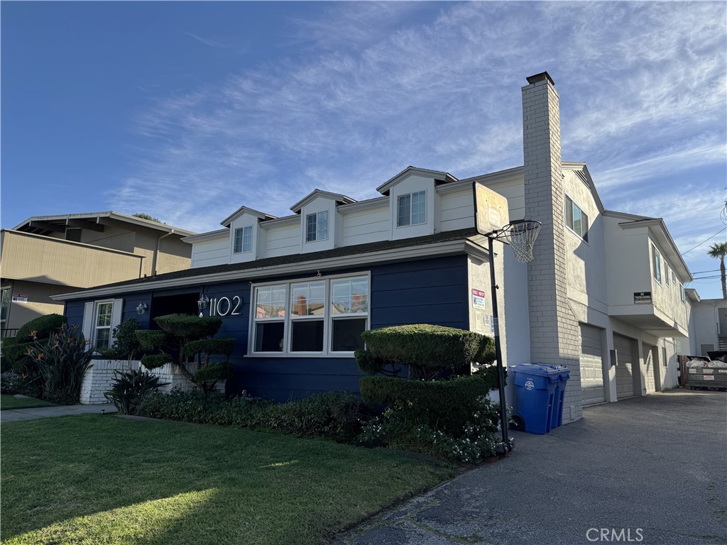 1102 Barbara Street, Unit B Redondo Beach, CA 90277 - Photo 22 of 22 a front view of a house with garden