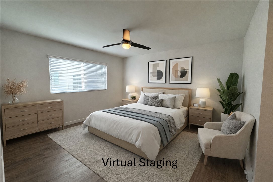 1102 Barbara Street, Unit B Redondo Beach, CA 90277 - Photo 10 of 22 a bedroom with a bed and a potted plant