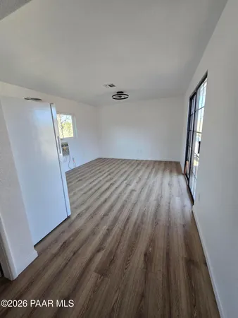 wooden floor in a hall with an entryway