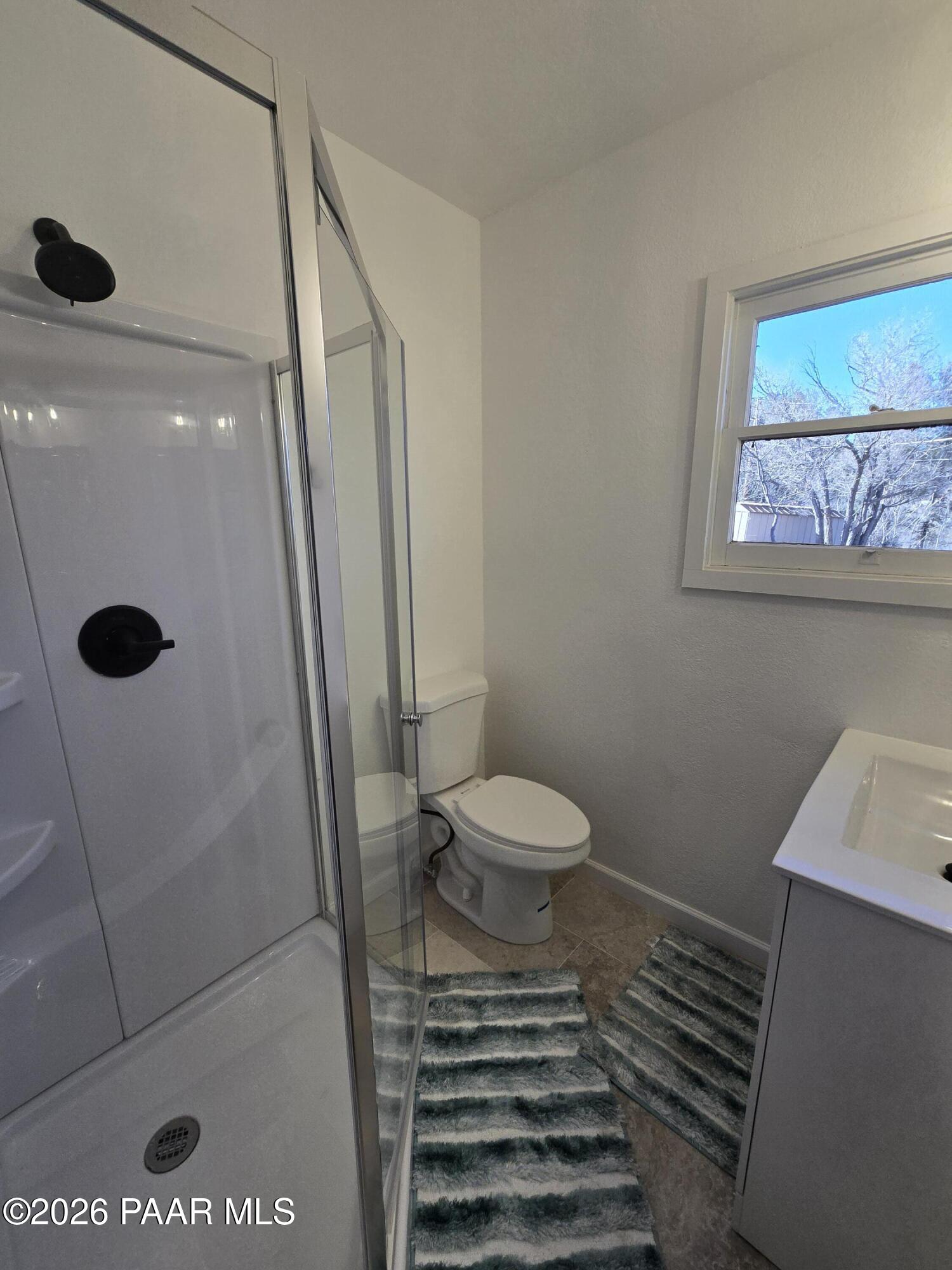 410 White Spar Road Prescott, AZ 86303 - Photo 12 of 20 a bathroom with a toilet and a shower