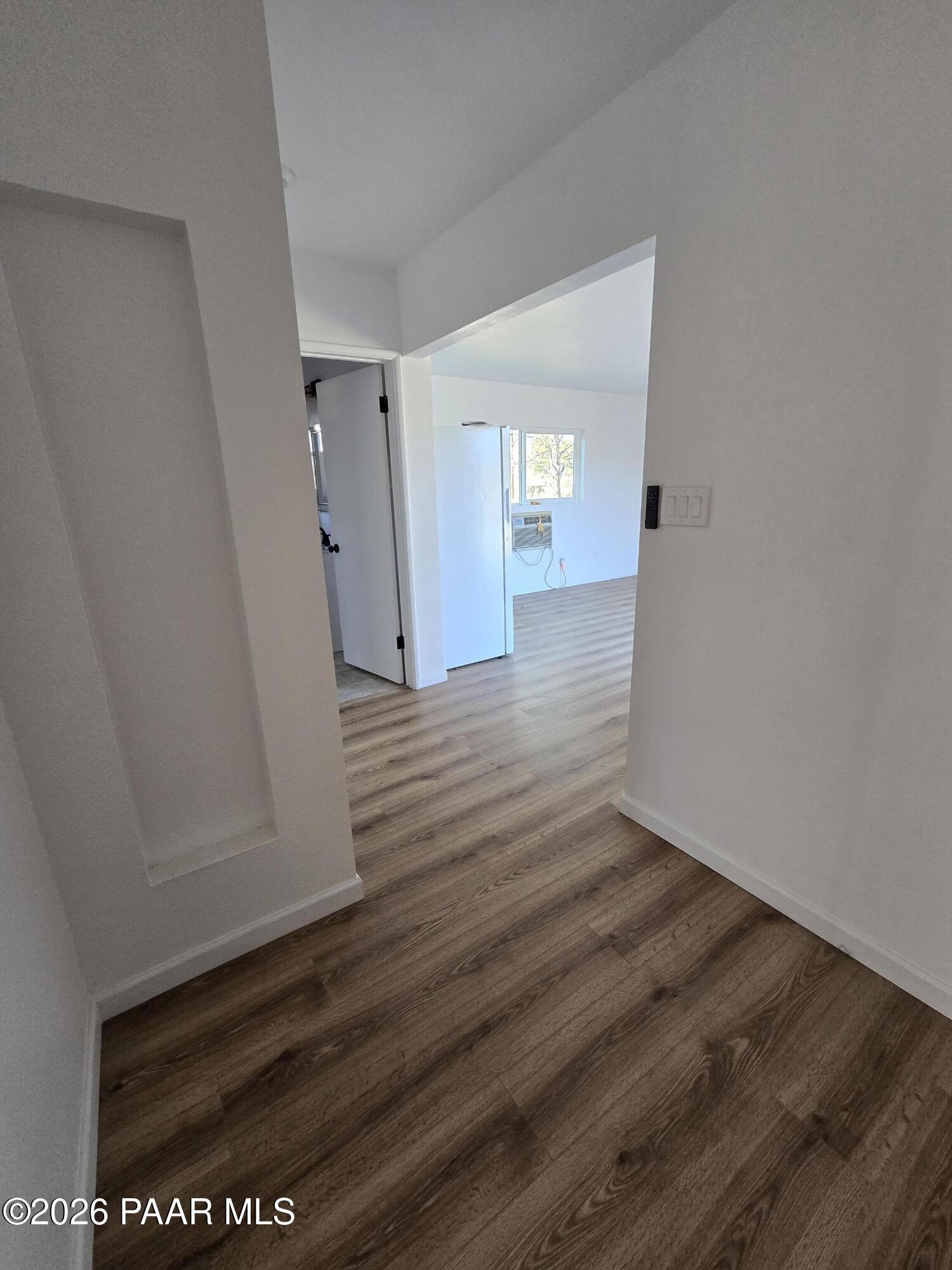 410 White Spar Road Prescott, AZ 86303 - Photo 10 of 20 a view of a hallway with wooden floor