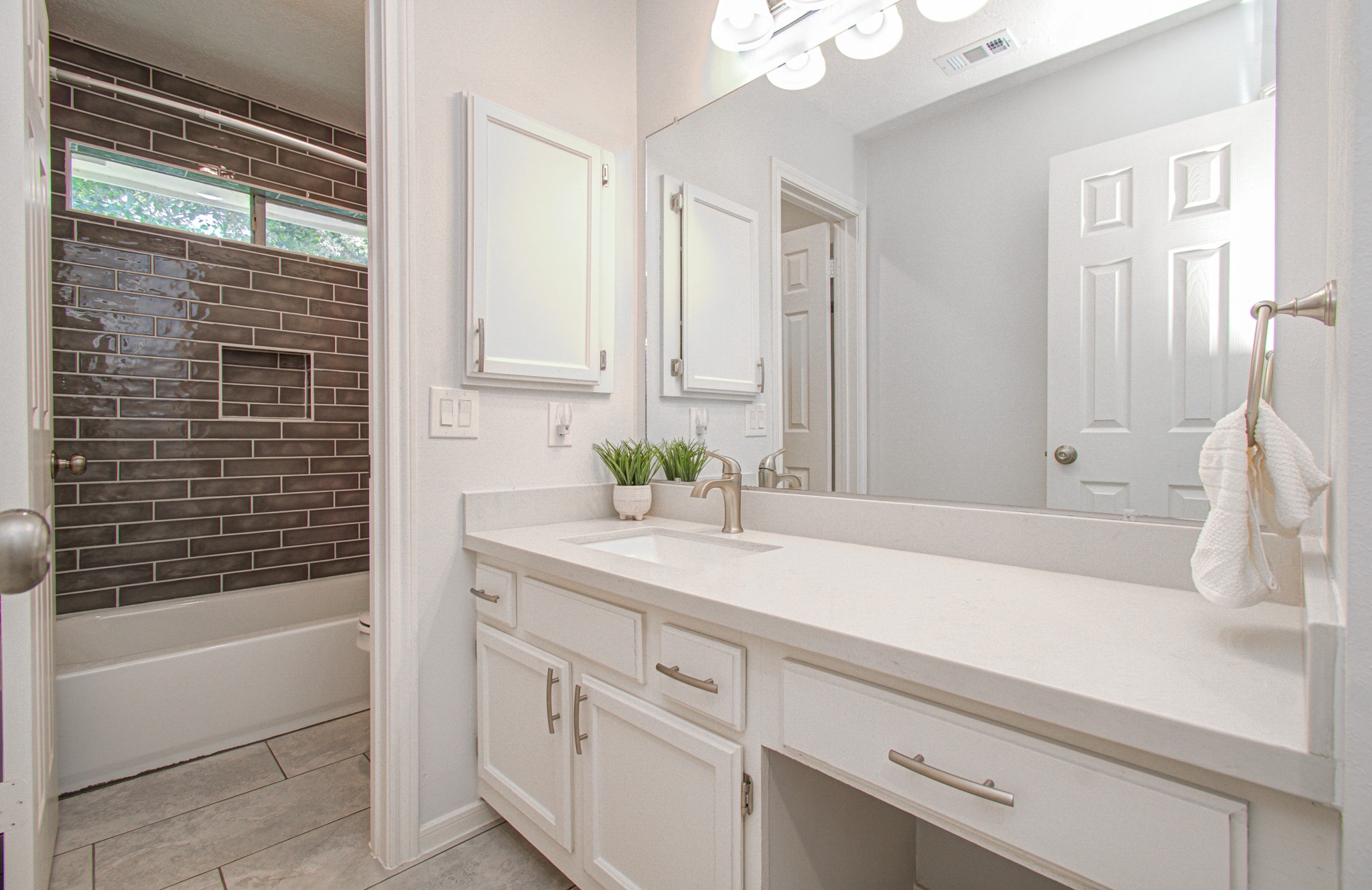 22927 Northoak Forest Lane Spring, TX 77389 - Photo 25 of 37 a bathroom with a sink and a bathtub