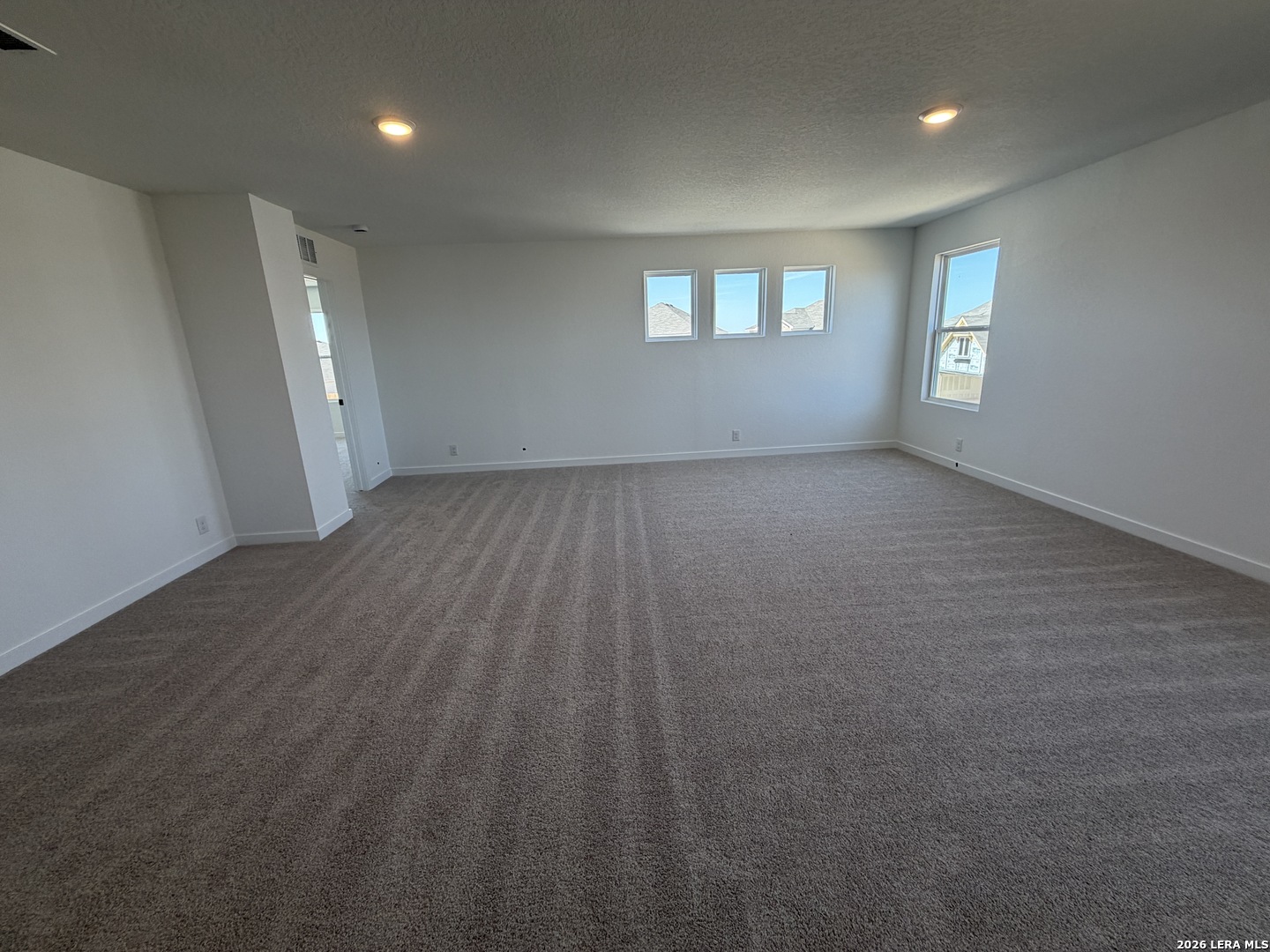 410 Nottabi Road Adkins, TX 78101 - Photo 24 of 33 an empty room with windows