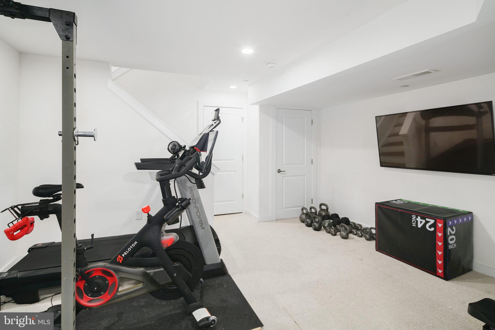 159 East Allen Street, Unit 1 Philadelphia, PA 19125 - Photo 42 of 45 a view of a room with gym equipment
