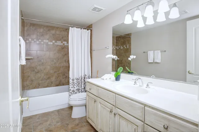 a view of a swimming pool with a yard