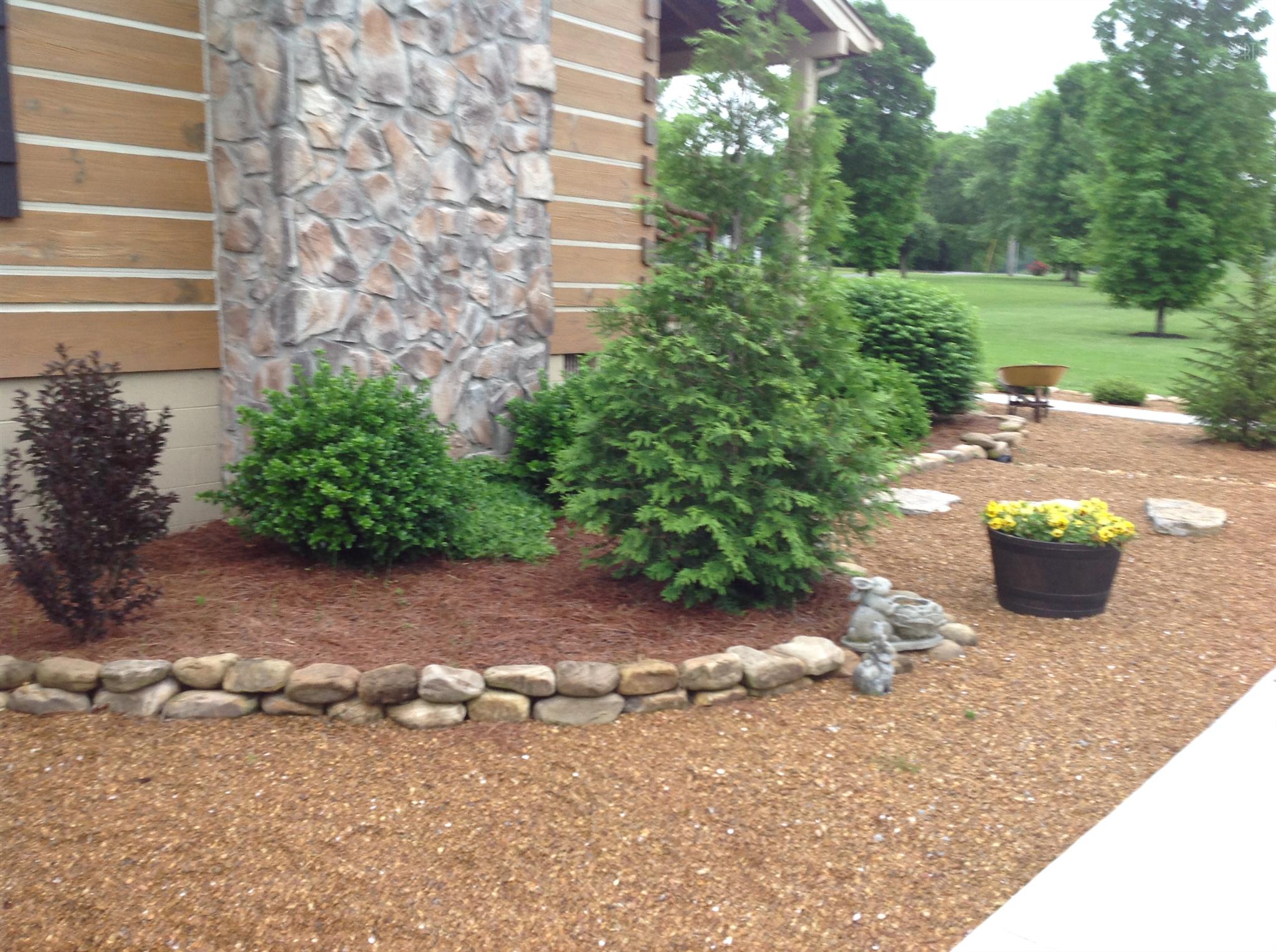 1099 Pinhook Road Lebanon, TN 37090 - Photo 2 of 26 a view of a backyard with plants and trees