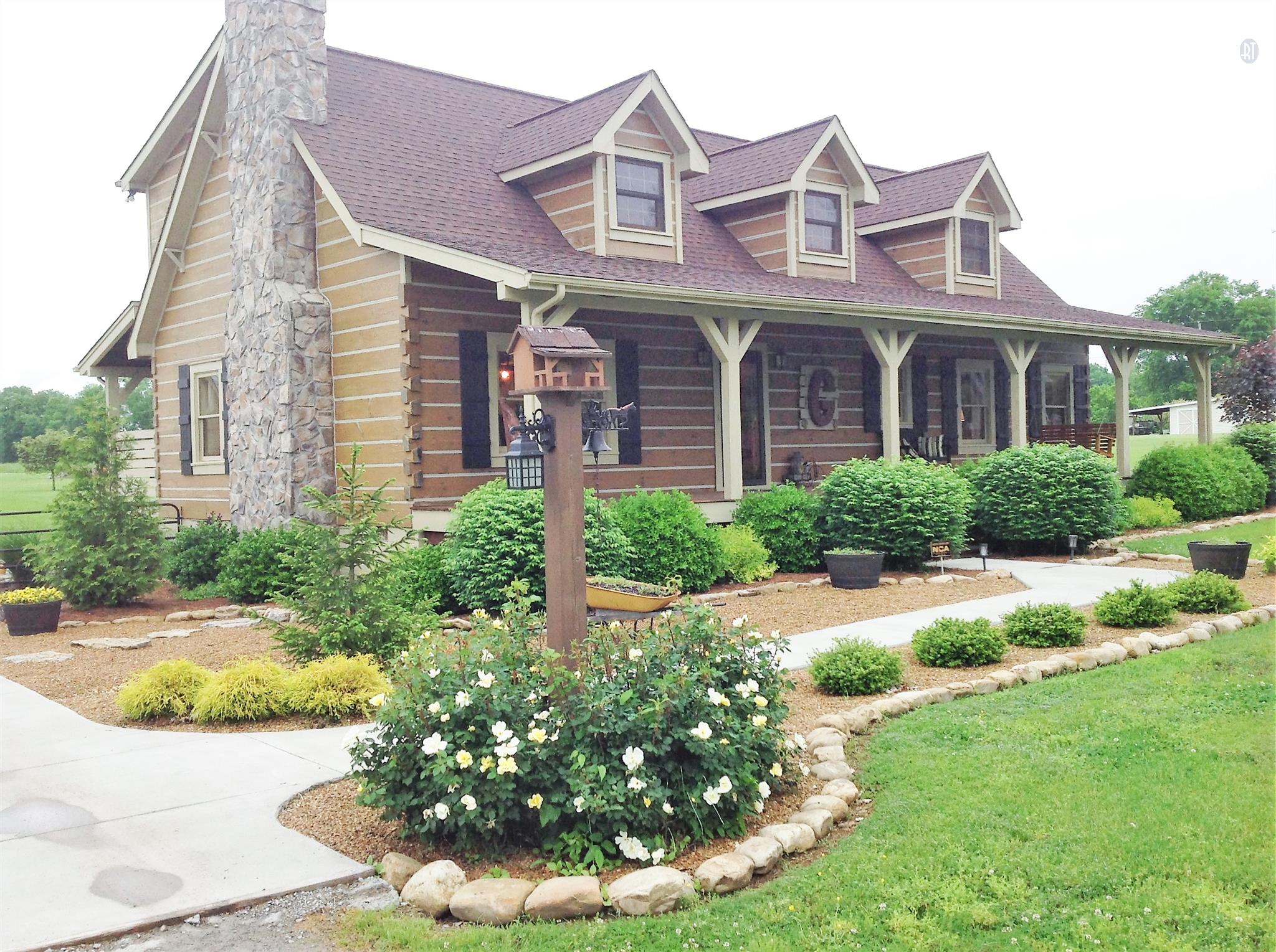 1099 Pinhook Road Lebanon, TN 37090 - Photo 13 of 26 a front view of a house with garden