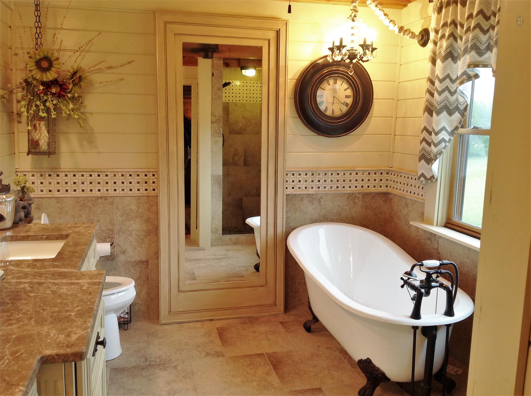 1099 Pinhook Road Lebanon, TN 37090 - Photo 14 of 26 a bathroom with a sink and a mirror