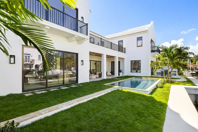 a view of swimming pool with a lounge chair
