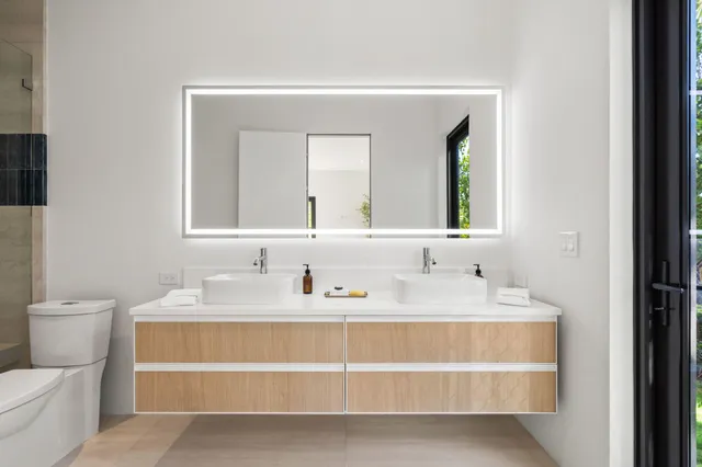 a view of a living room and a flat screen tv