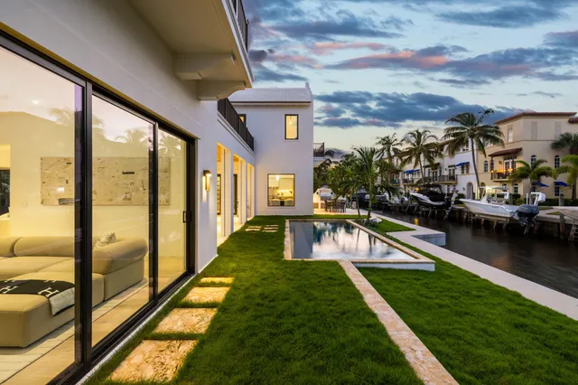 a view of swimming pool with outdoor seating