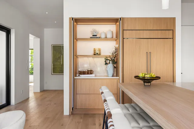 a living room with a garden and furniture