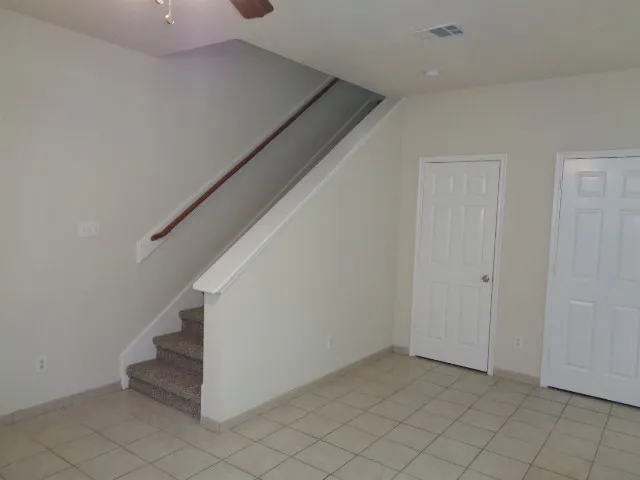 a view of entryway and hall with a window