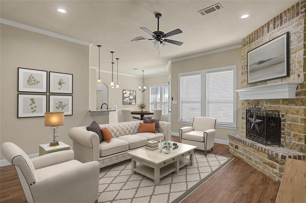 143 Wrigley Drive Springtown, TX 76082 - Photo 6 of 40 Virtually Staged - Living area featuring a stone fireplace with a white mantel, wood-finish flooring, recessed lighting, and a ceiling fan