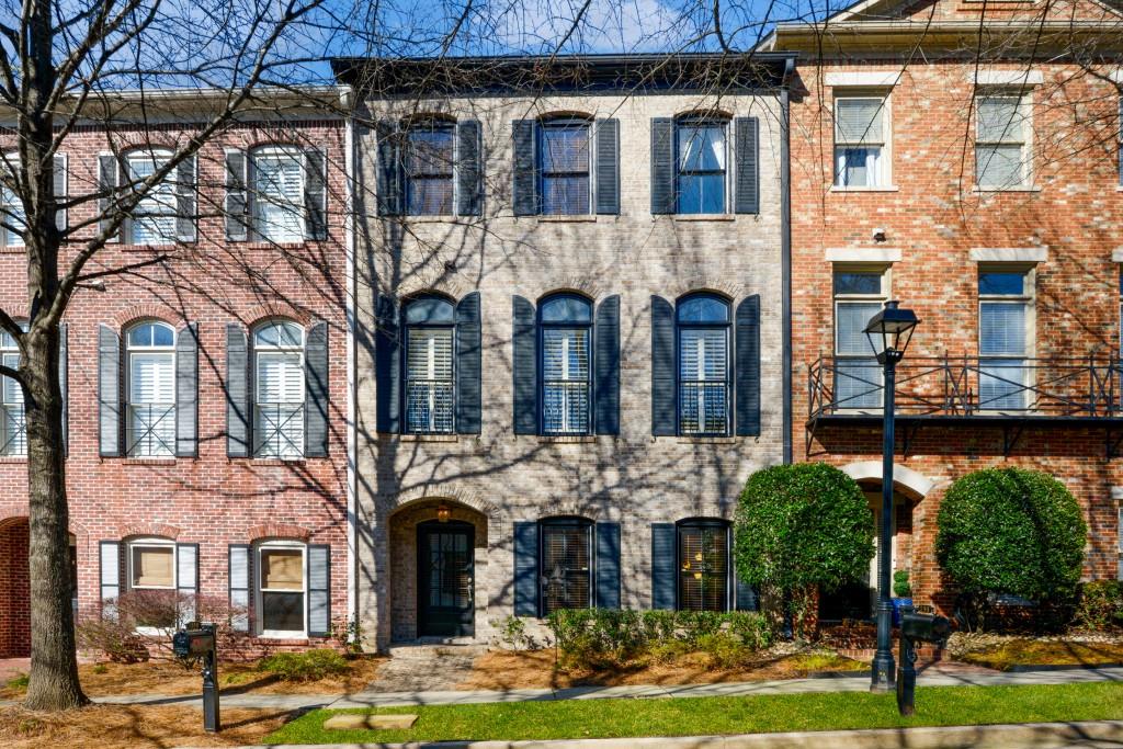 150 West Ridge Way Roswell, GA 30076 - Photo 1 of 1 a front view of a building with garden