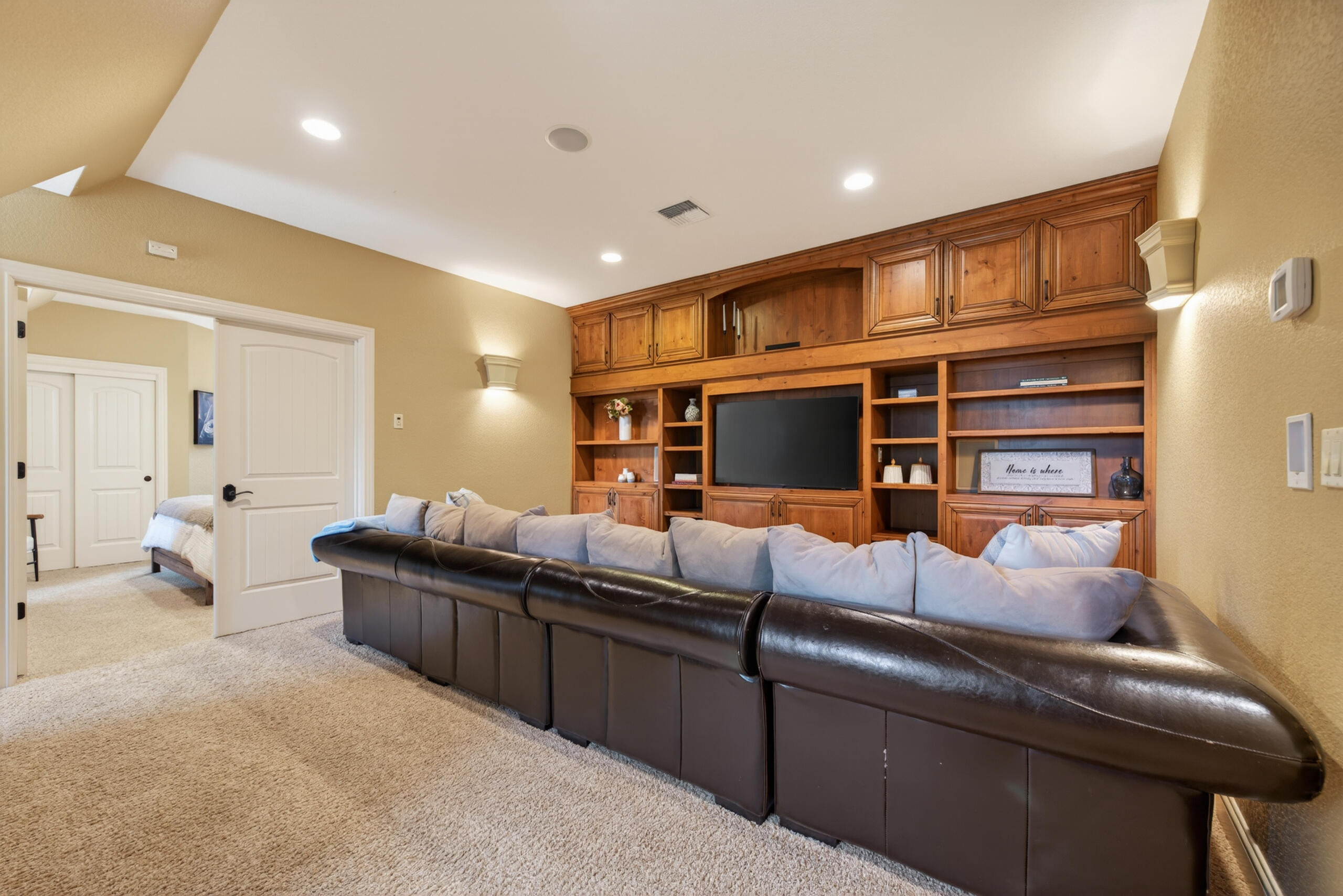 9009 Merlin Drive Redmond, OR 97756 - Photo 61 of 98 a living room with furniture and a flat screen tv