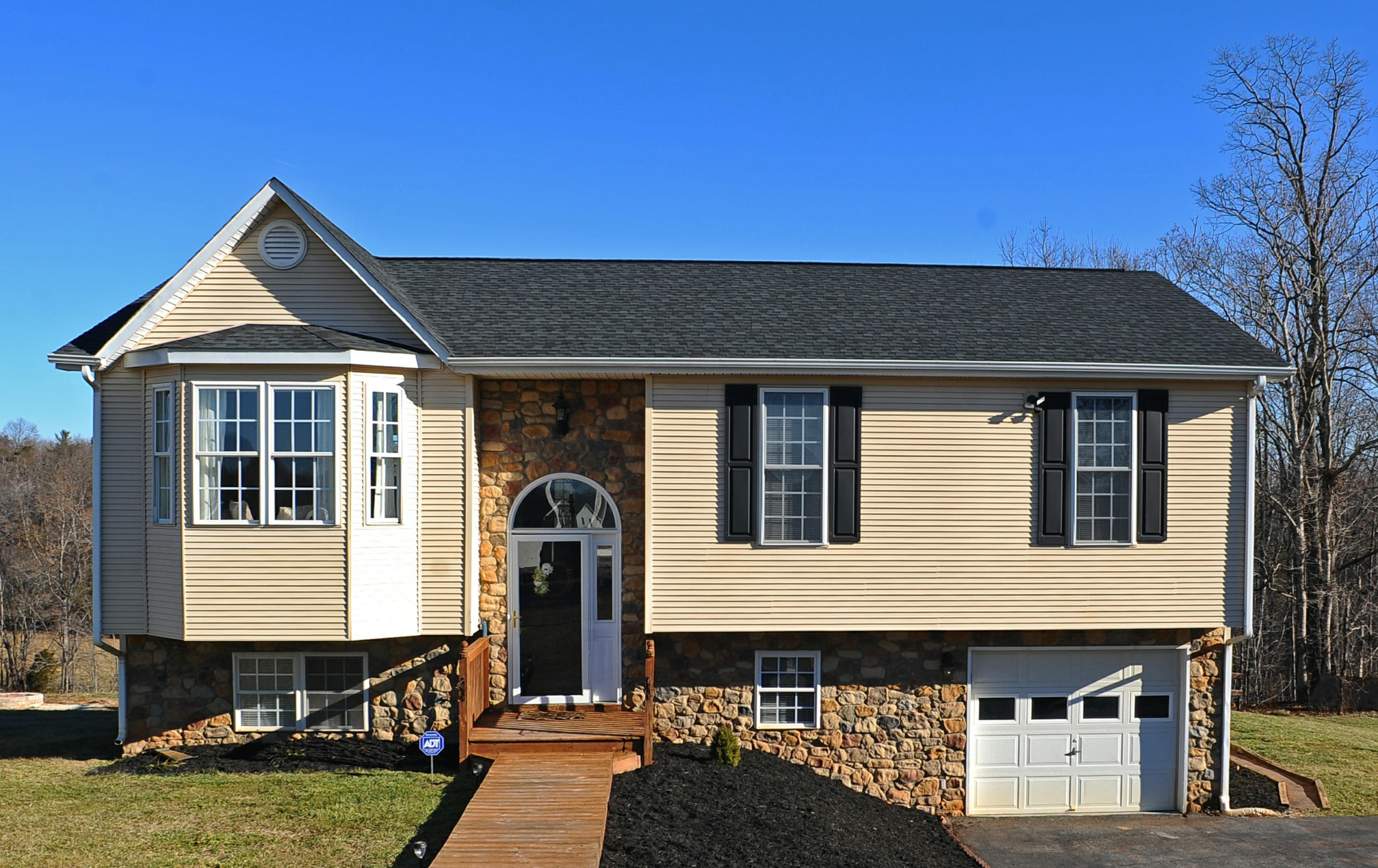 265 Northridge Road Hardy, VA 24101 - Photo 1 of 59 a front view of a house with garden