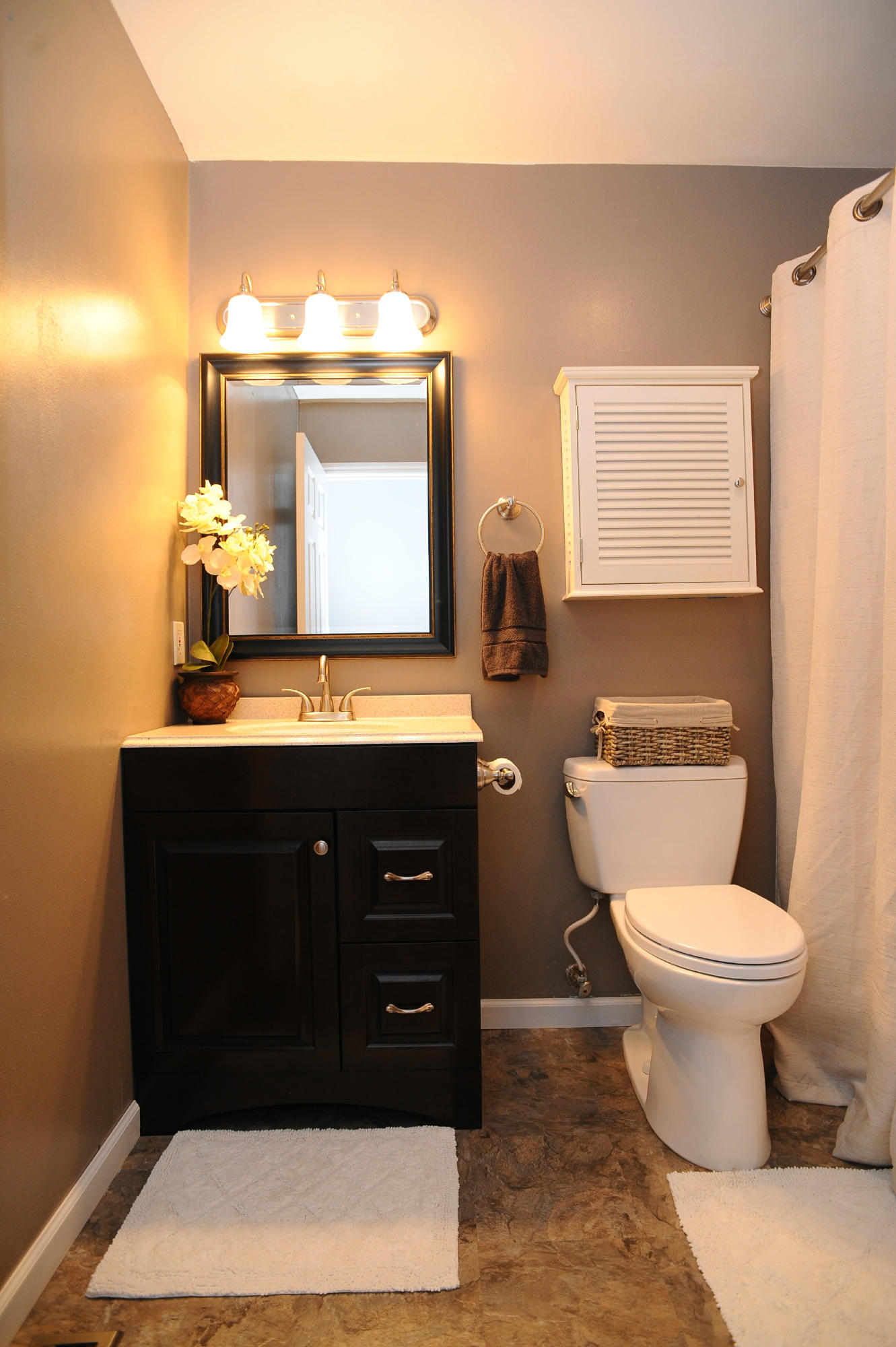 265 Northridge Road Hardy, VA 24101 - Photo 22 of 59 a bathroom with a toilet sink and mirror
