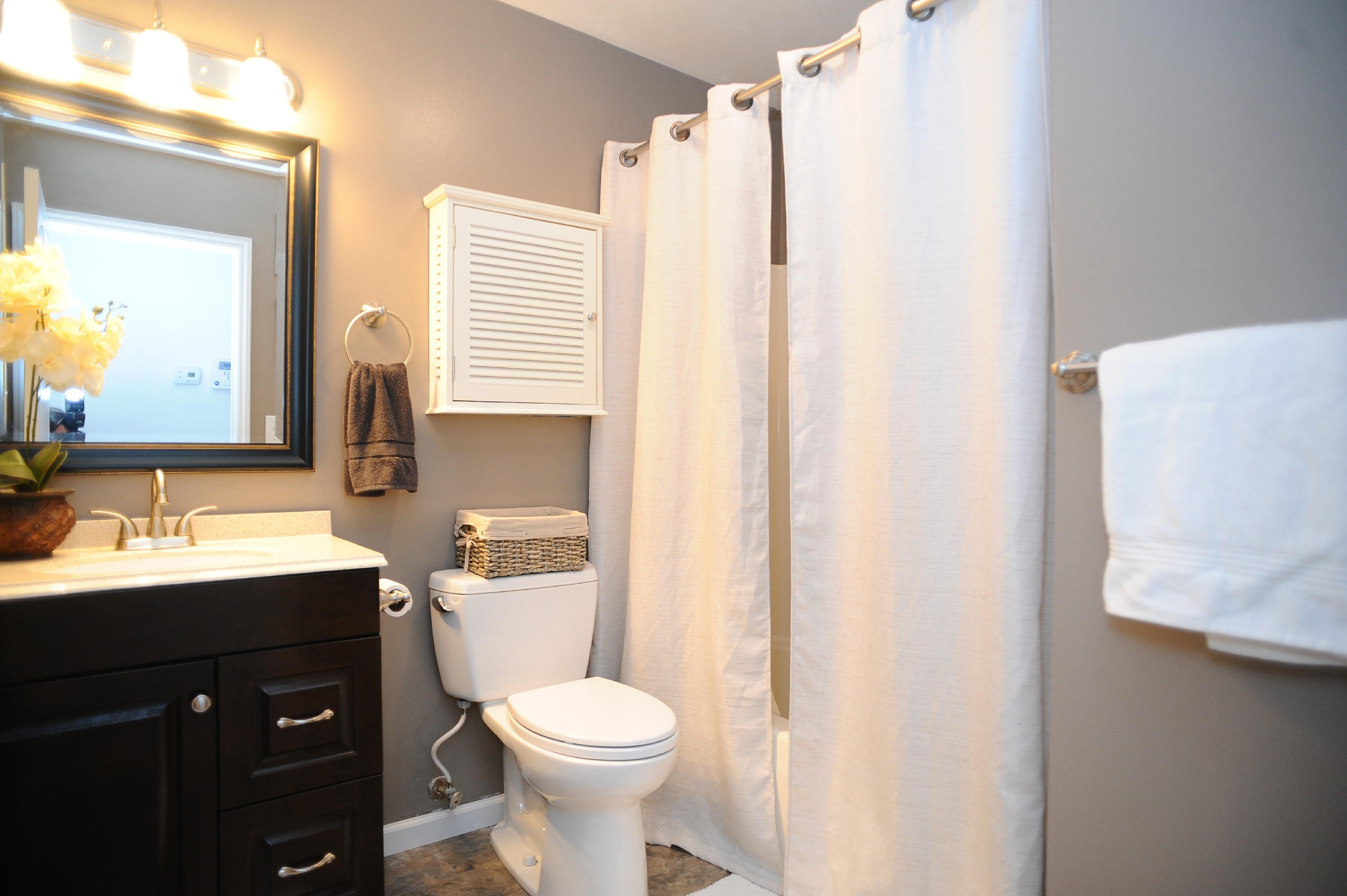 265 Northridge Road Hardy, VA 24101 - Photo 24 of 59 a bathroom with a sink a toilet and a mirror