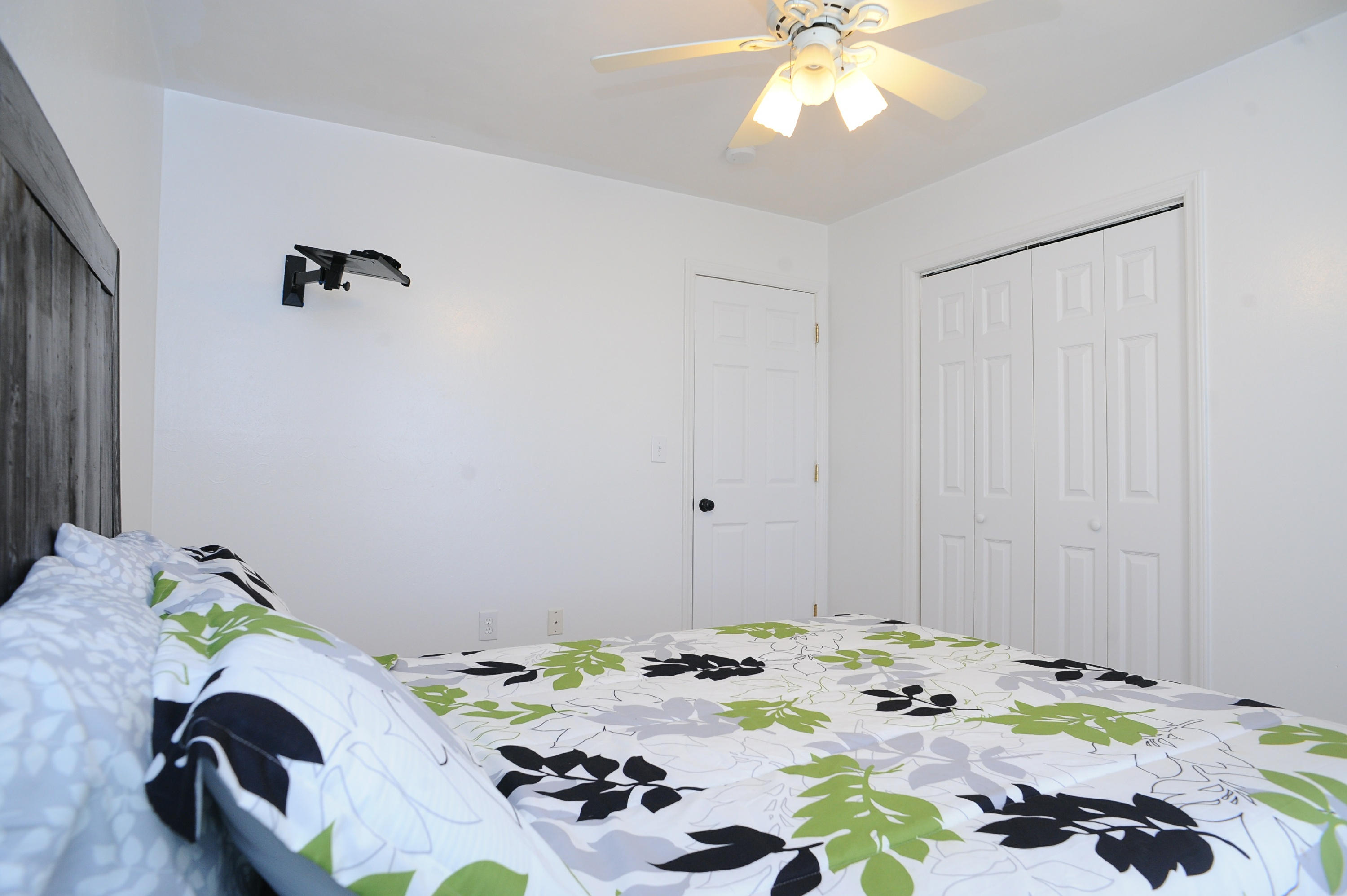 265 Northridge Road Hardy, VA 24101 - Photo 26 of 59 a bedroom with a bed and a chandelier