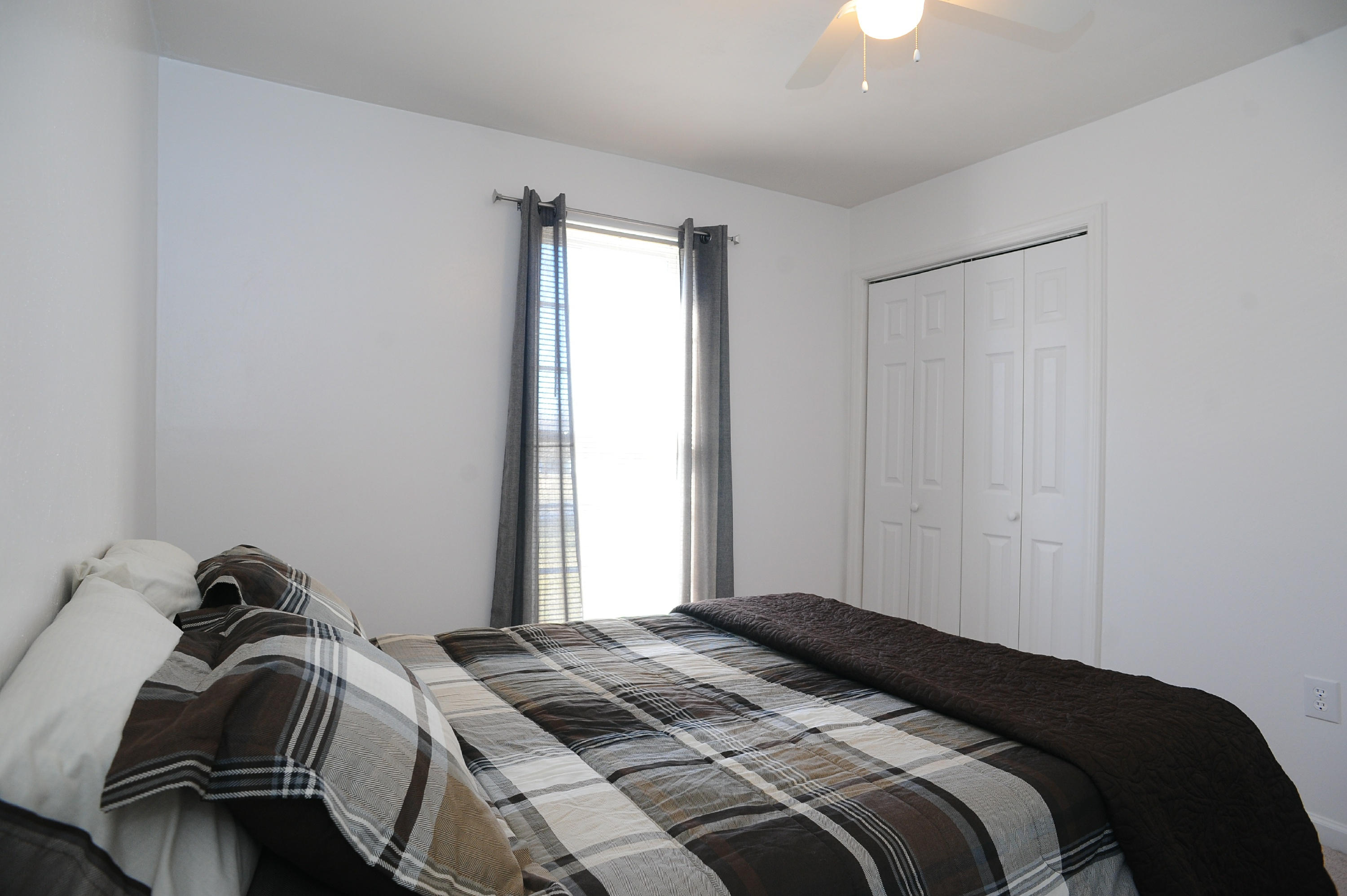 265 Northridge Road Hardy, VA 24101 - Photo 29 of 59 a bedroom with a bed and a window