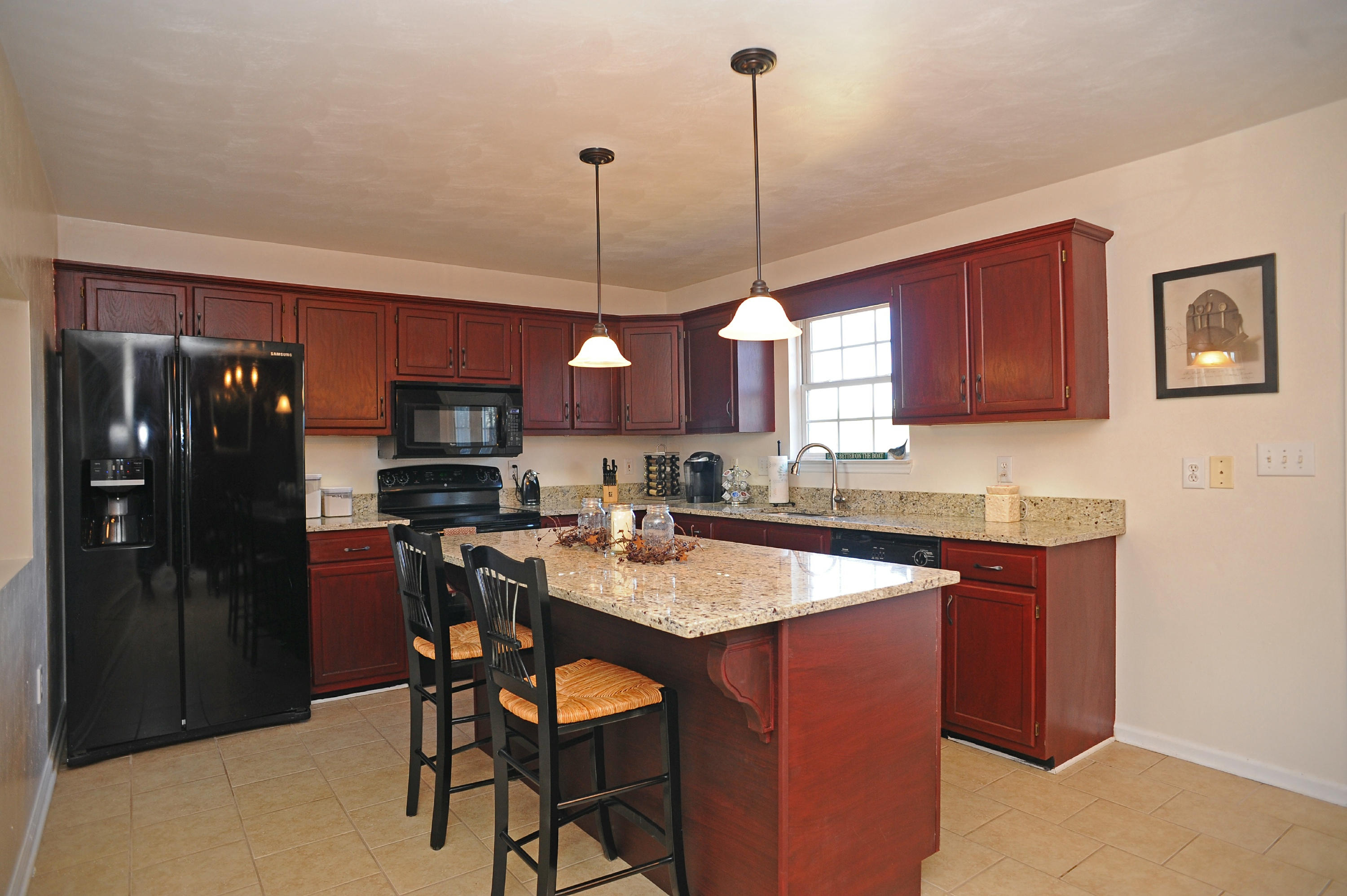 265 Northridge Road Hardy, VA 24101 - Photo 4 of 59 a kitchen with stainless steel appliances granite countertop a refrigerator a sink dishwasher a stove and a wooden floor