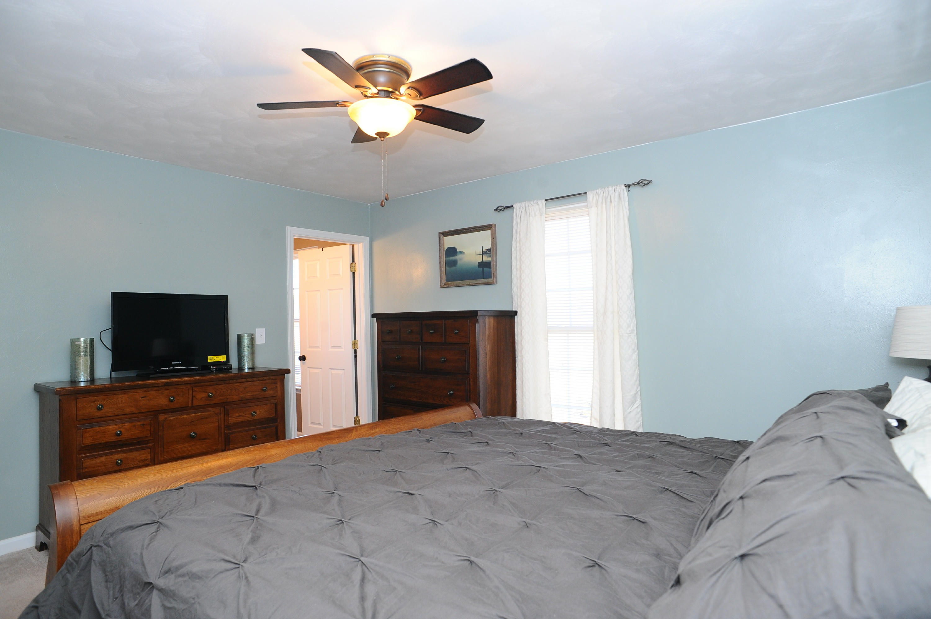265 Northridge Road Hardy, VA 24101 - Photo 32 of 59 a bedroom with a bed and a flat screen tv