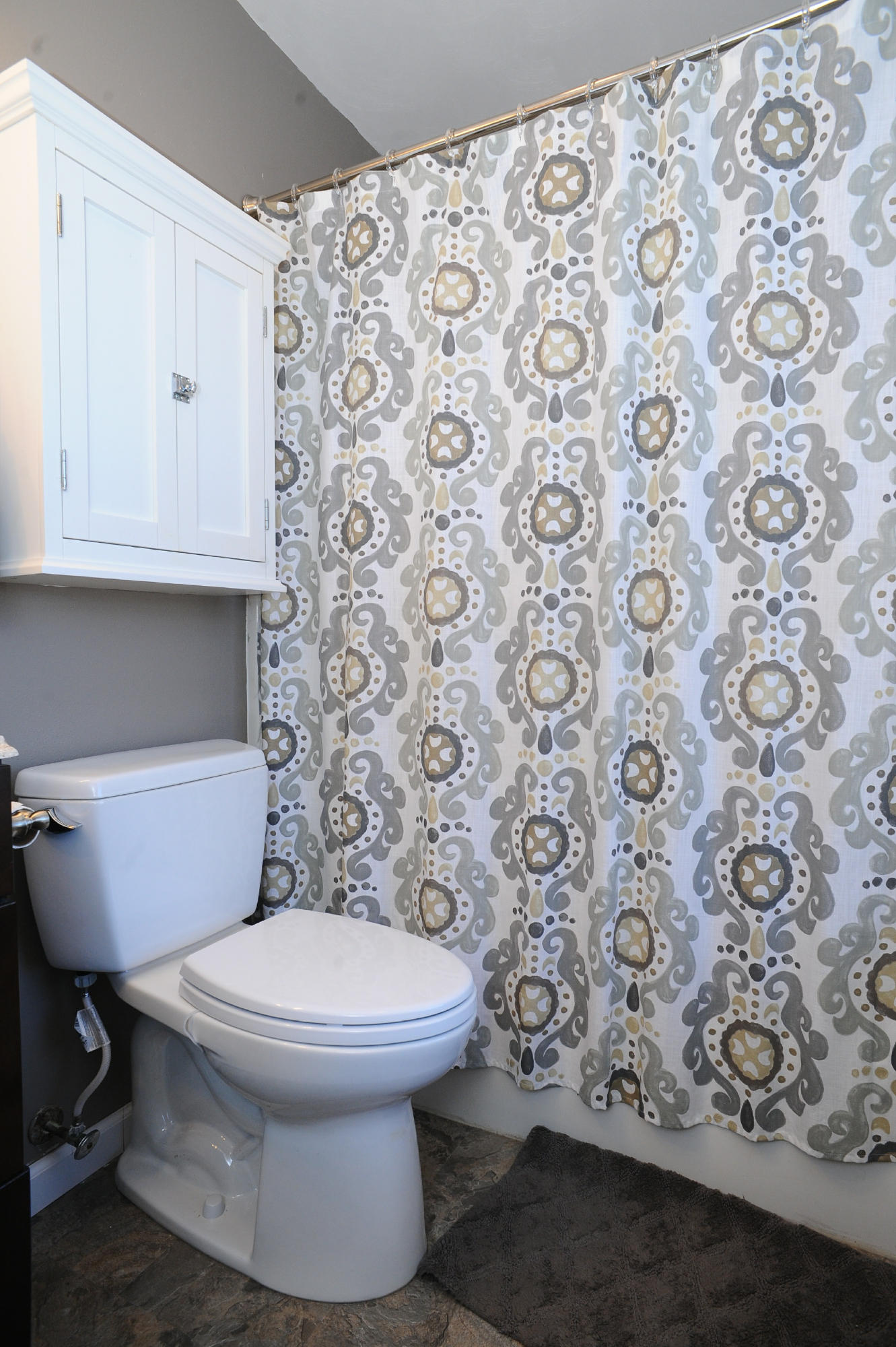 265 Northridge Road Hardy, VA 24101 - Photo 35 of 59 a white toilet sitting next to a shower curtain
