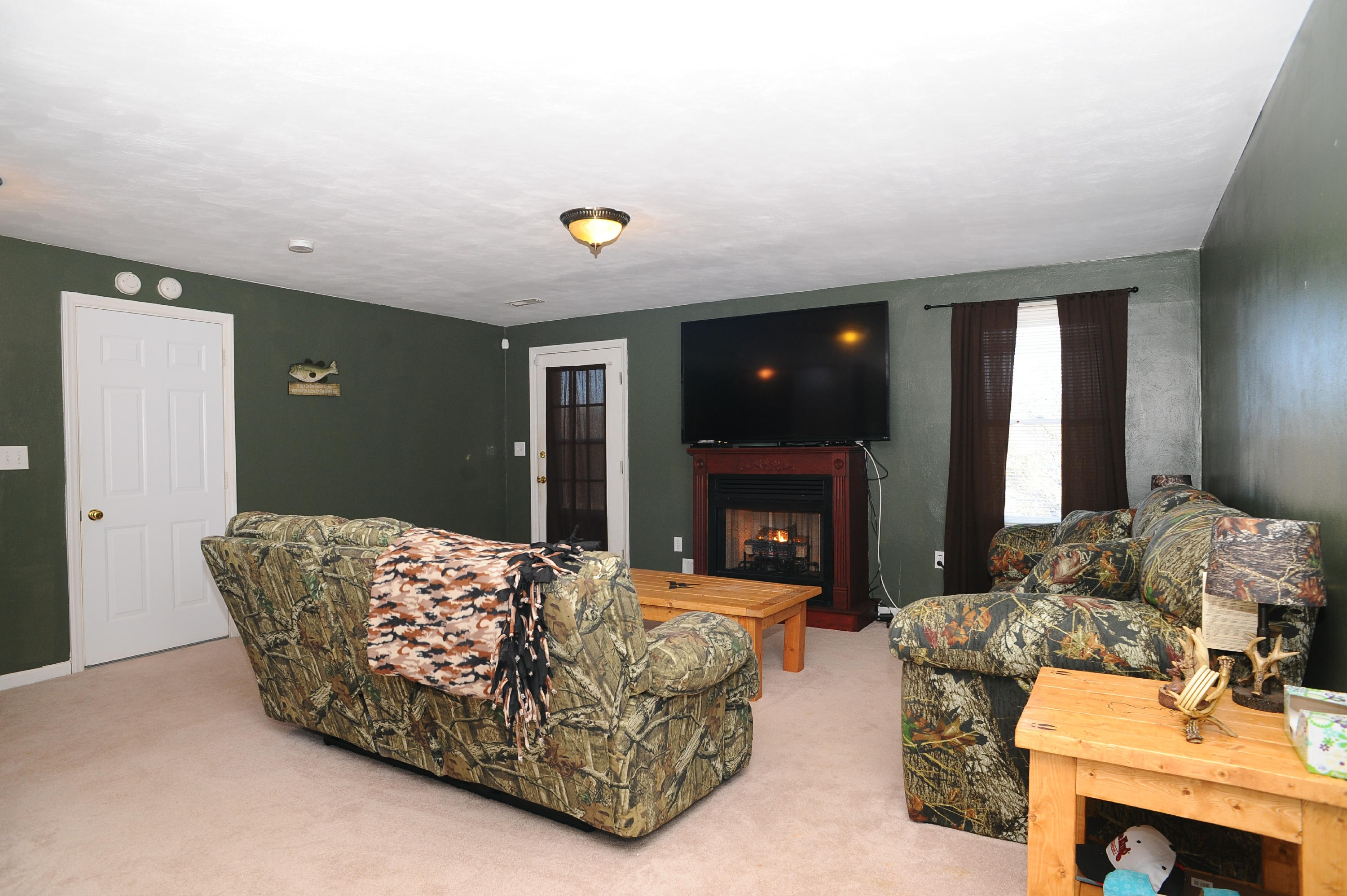 265 Northridge Road Hardy, VA 24101 - Photo 41 of 59 a living room with furniture a fireplace and a fireplace