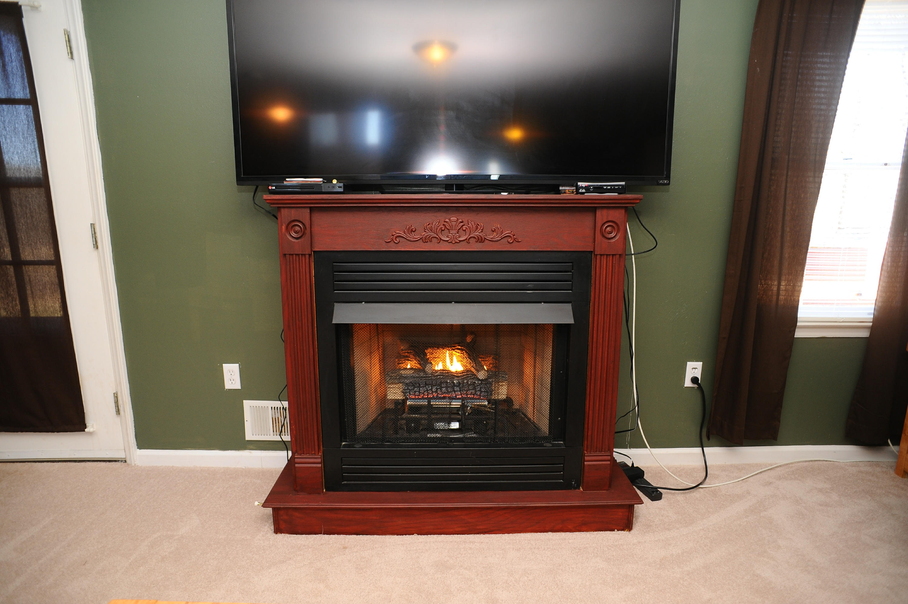 265 Northridge Road Hardy, VA 24101 - Photo 42 of 59 a view of fireplace in livingroom with wooden floor