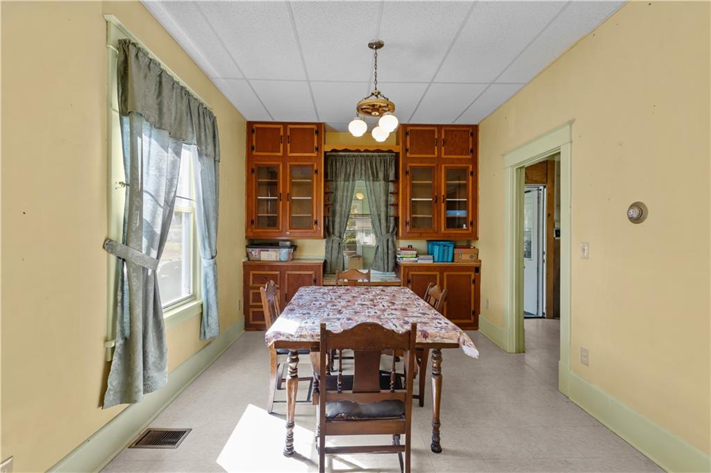 626 Sterner Street Confluence, PA 15424 - Photo 17 of 49 a view of a dining room with furniture window and wooden floor