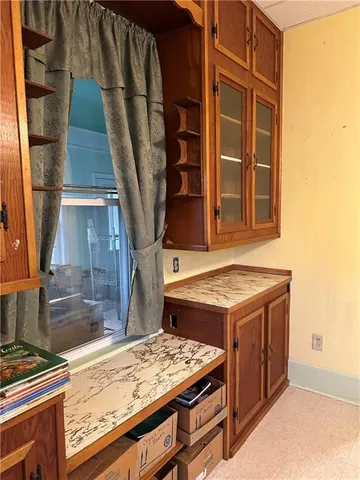 a view of a livingroom with a furniture and a ceiling fan