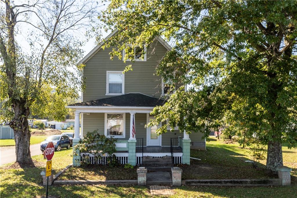 626 Sterner Street Confluence, PA 15424 - Photo 2 of 49 a front view of a house with garden