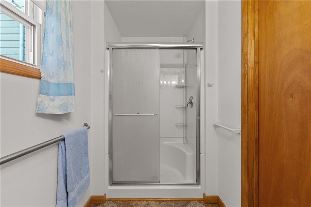 626 Sterner Street Confluence, PA 15424 - Photo 25 of 49 a bathroom with a glass shower door