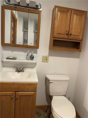 a bathroom with a shower and a sink