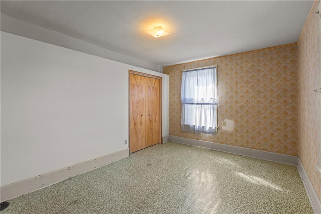 626 Sterner Street Confluence, PA 15424 - Photo 34 of 49 an empty room with a empty space and windows