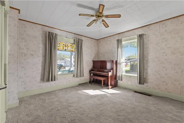 a view of an empty room with a window