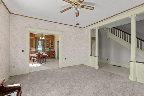 a view of an empty room with a window