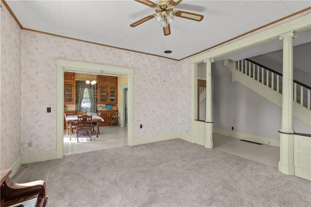 a view of an empty room with a window