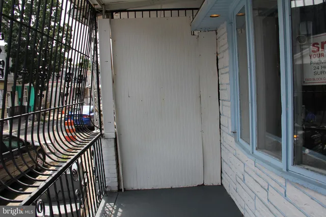 a view of a balcony with a door