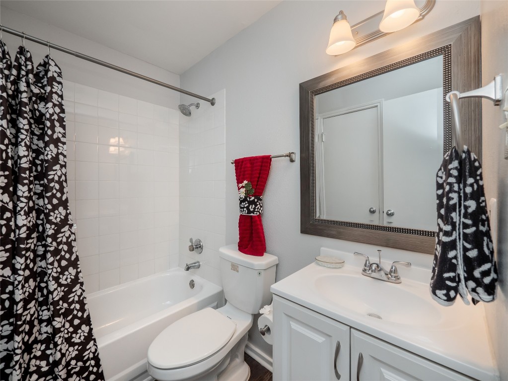 1740 Timber Ridge Road, Unit 132 Austin, TX 78741 - Photo 16 of 26 a bathroom with a sink toilet and shower