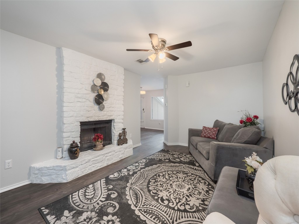 1740 Timber Ridge Road, Unit 132 Austin, TX 78741 - Photo 5 of 26 a living room with furniture and a fireplace
